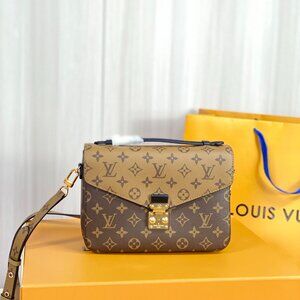 Pochette Metis Reverse Monogram Canvas Cross Body Bag